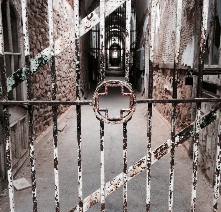 Closeup image of the Haunted House Penitentiary in Philadelphia, Pennsylvania for a Halloween trip destination. 
