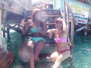 Two Girls Laughing in San Pedro Palapas Bar