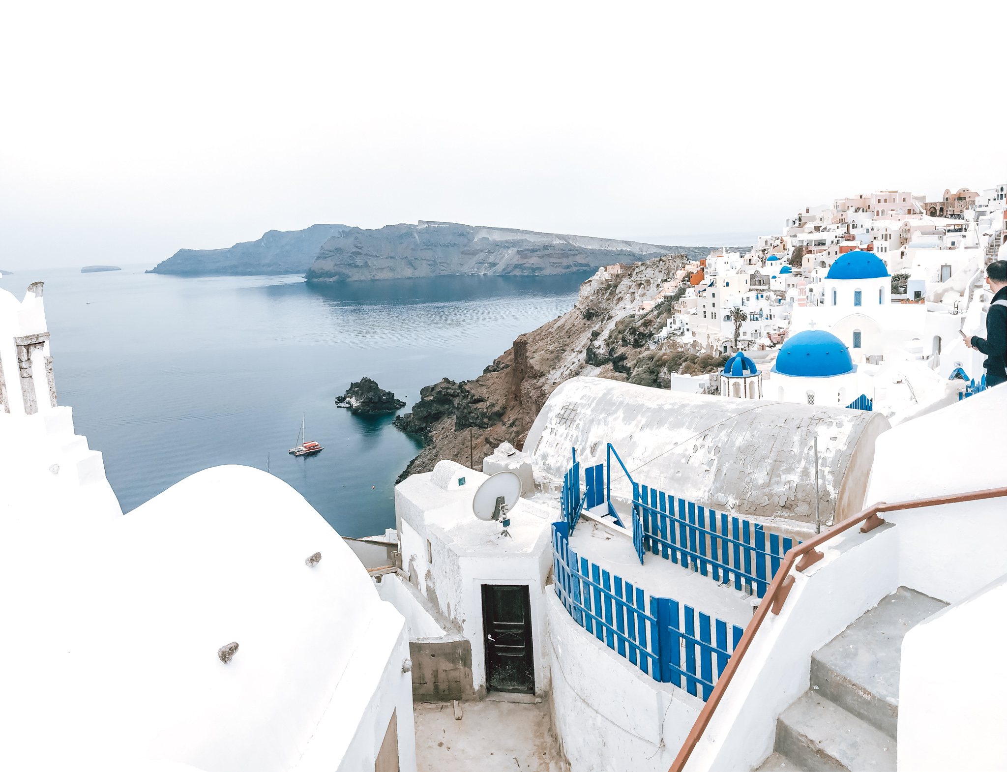 Santorini Greece View with Blue Top Buildings and Water