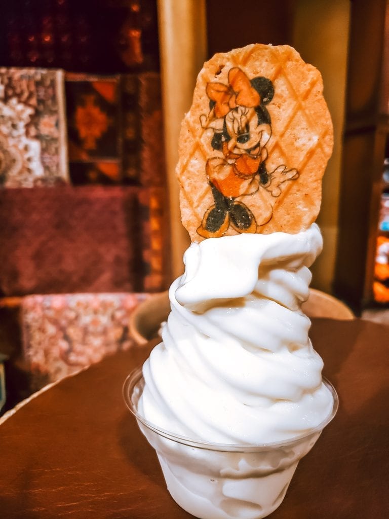 Soft Serve Ice Cream bowl with Minnie Mouse Wafer Cookie on top from Disney World. 