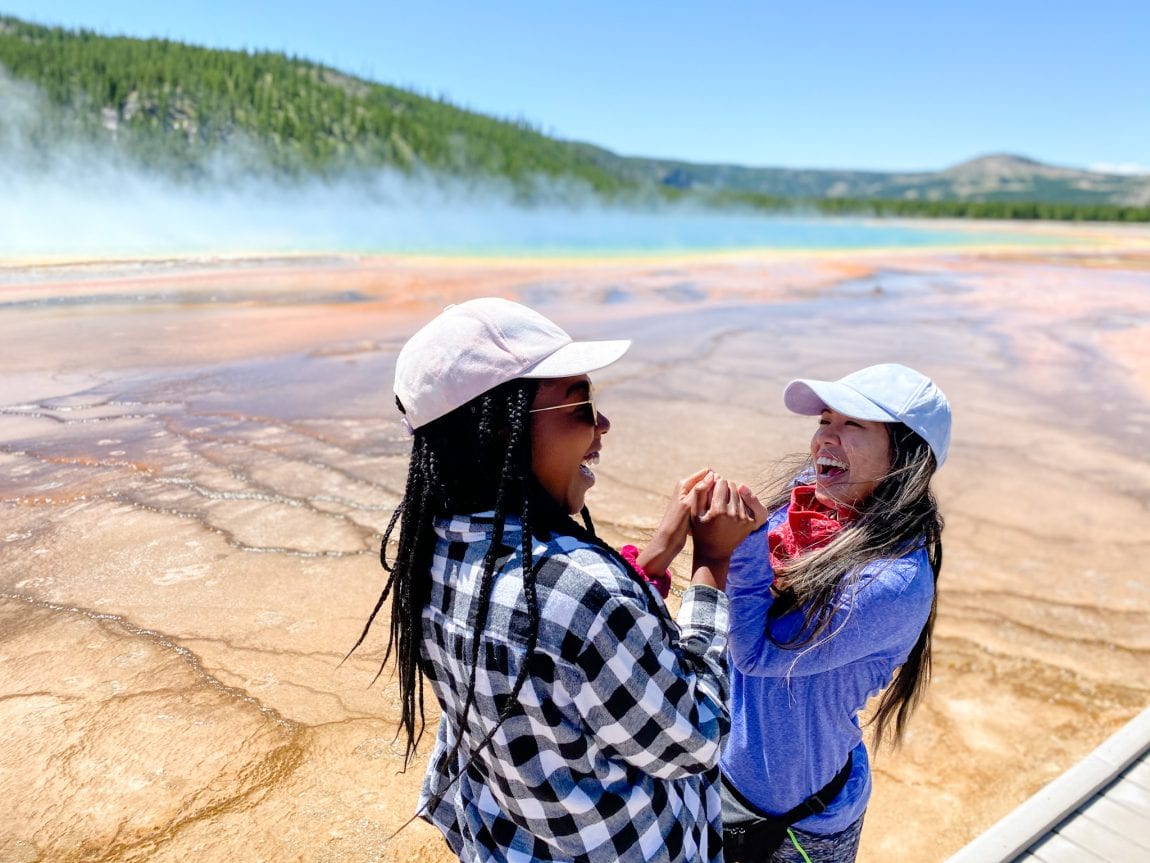 Two girls on a trip to Yellowstone at Prismatic Springs