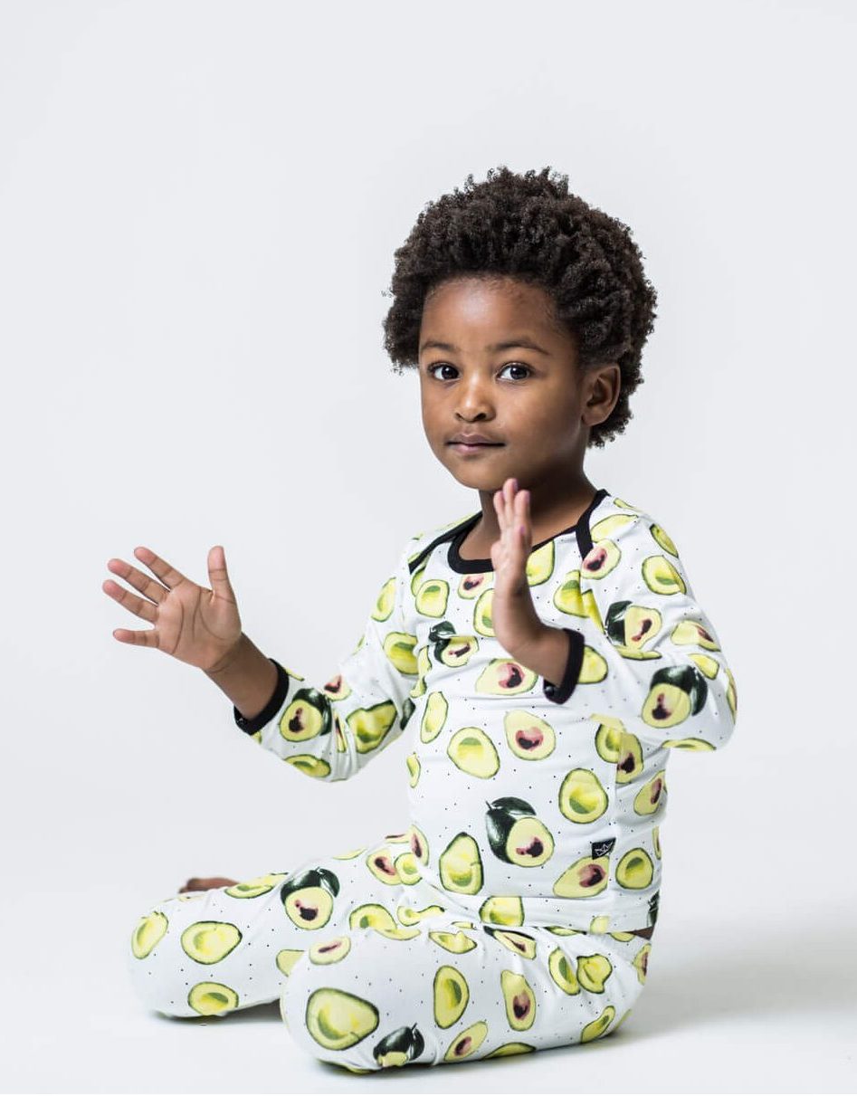 Little boy wearing avocado pajamas 