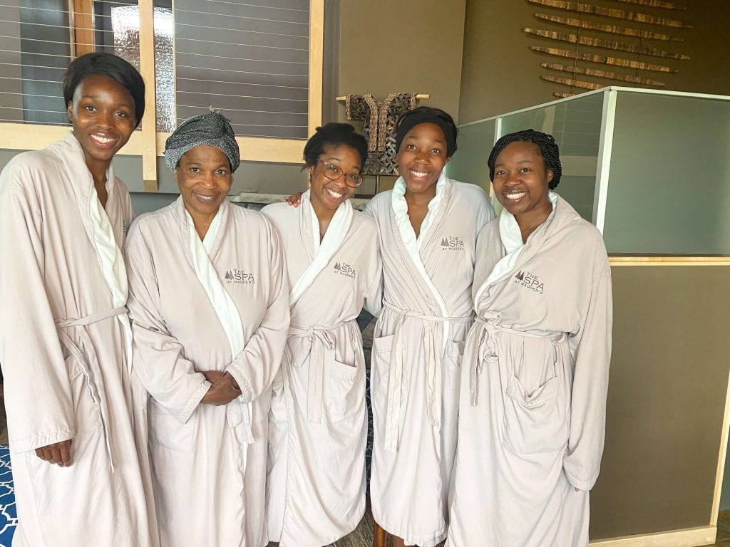 5 black women in robes at the Spa in Madden's resort 
