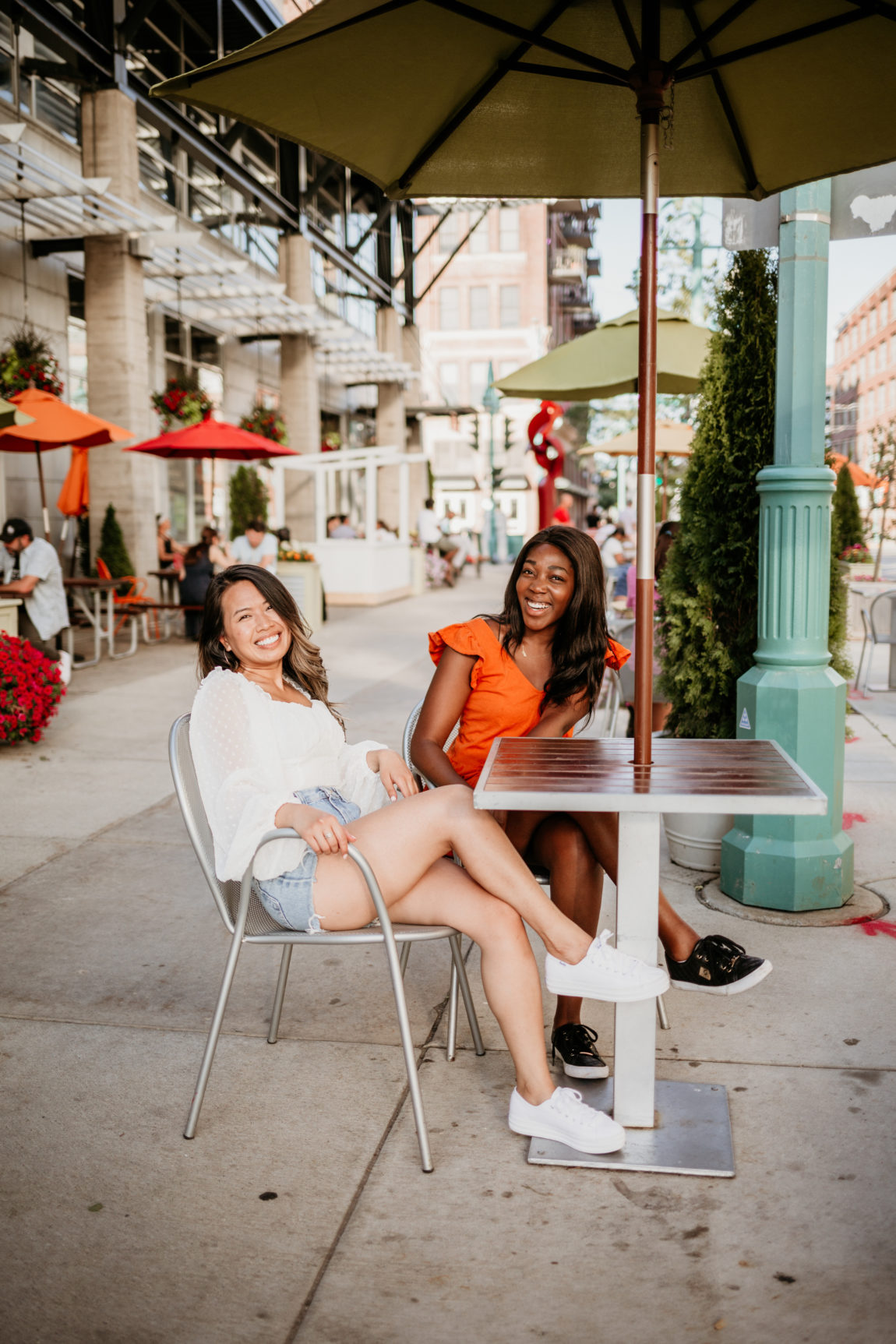 Two woman sitting at outdoor patio