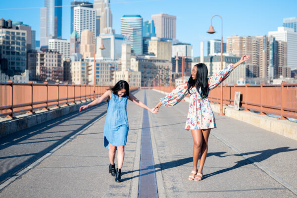 Two friends on the Stone Arch Bridge in Minneapolis